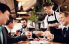 Waiter serving drinks in a restaurant